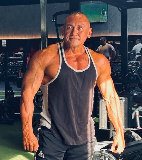 Gym physique in tank top